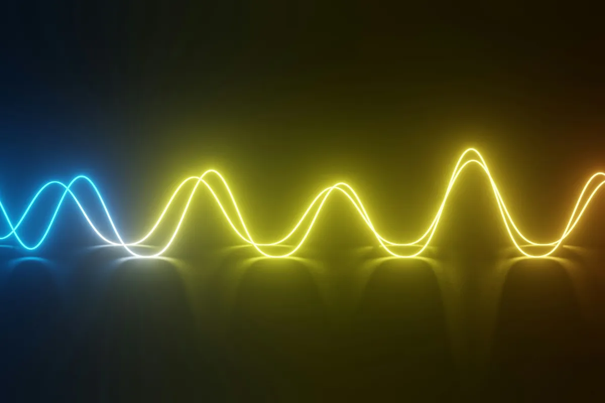Abstract emotional frequency wave transitioning from low to high vibration in blue to yellow to orange gradient